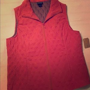 Pink/salmon colored thin vest,